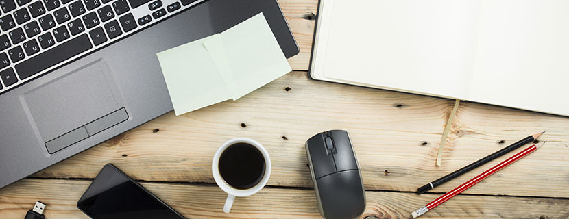Photo of a desk with a computer